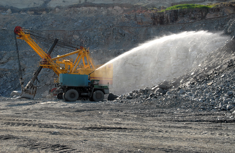 continental-water-mining-agricultural Mining truck spraying water at mine site